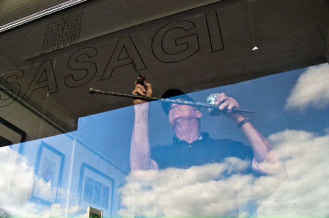 Ray Pedersen, Hand Painting A Bespoke Window Sign In Melbourne, Australia