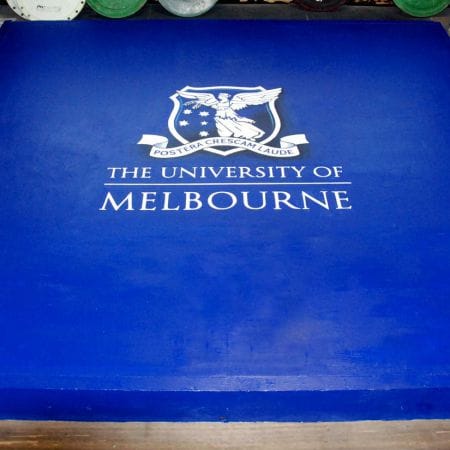 Hand painted logo on Melbourne University Power lifting platform