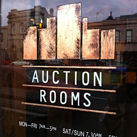 auction rooms reverse lettering and logo finished using copper leaf NthMelbourneVictoria sq